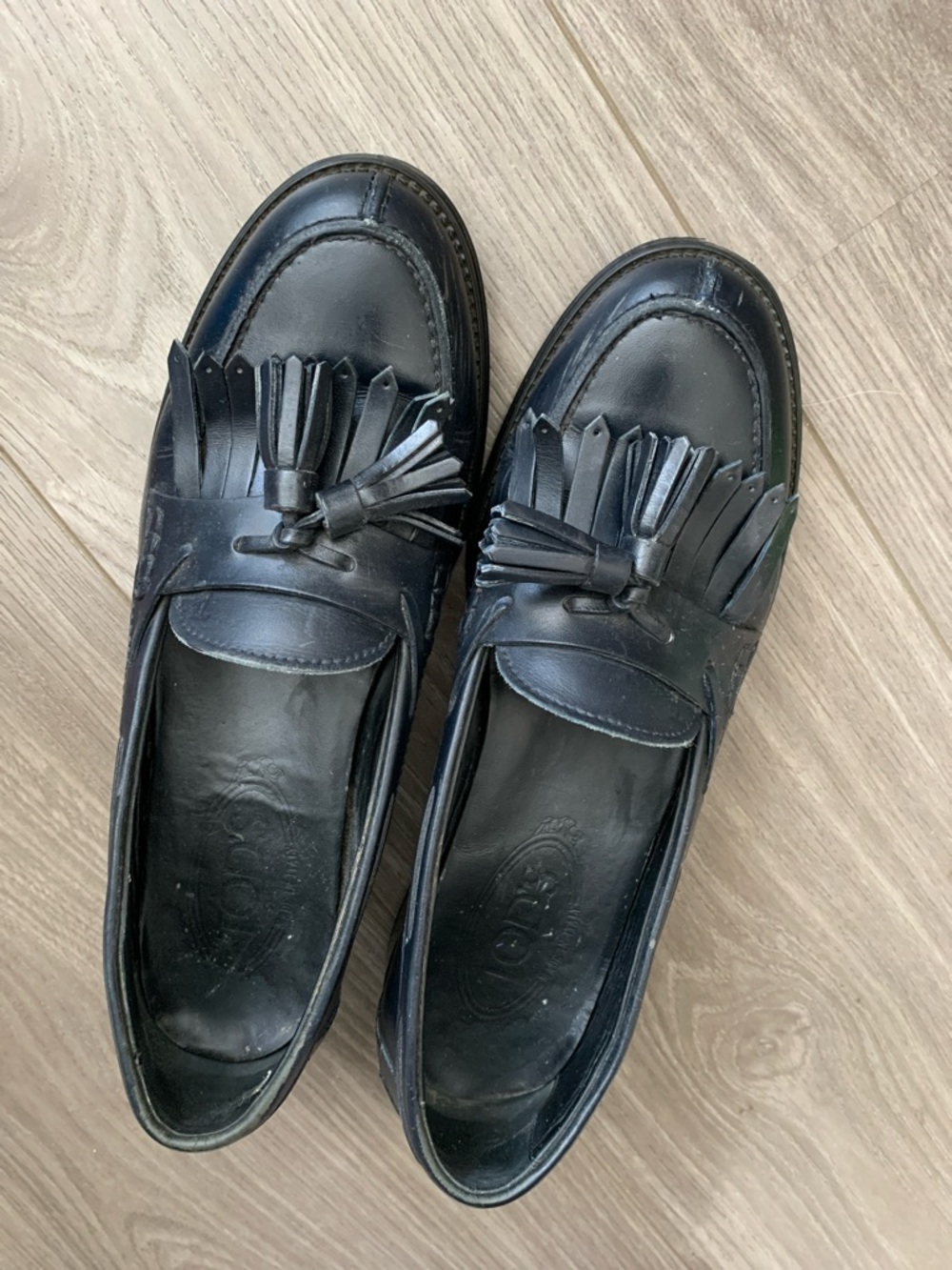 Tod's Black Leather Kiltie Tassel Loafers